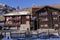 Traditional wooden old houses on a background mountains in Swiss resort of Saas-Fee