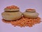 Traditional wooden pots containing pulses in white background