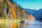 Traditional wooden Raft boat with tourists floating along Dunajec river gorge