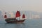 Traditional Wooden Sailboat sailing in Victoria Harbour in Hong