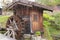 Traditional wooden water wheel spinning at Tsumago - juku in Tsumago