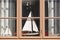 Traditional wooden window with model boats. Vintage background