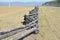 Traditional zigzag fence protecting a pasture in Buryatia. Tunkinskaya valley