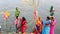 Traditionally dressed indian women pray and devote for Chhath Puja festival on Ganges riverside in Varanasi