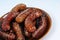 Traditionally grilled sausages on a plate