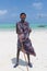 Traditonaly dressed black man on Paje beach, Zanzibar, Tanzania, East Africa.