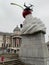 Trafalgar Square Fourth Plinth swirl of cream sculpture with a fly and a drone in London Uk England