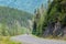 Traffic along the Cariboo Highway near the Ningunsaw River Ecological Preserve in British Columbia, Canada