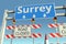 Traffic barricades near Surrey city traffic sign. Lockdown in Canada conceptual 3D rendering