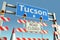 Traffic barricades near Tucson city traffic sign. Lockdown in the United States conceptual 3D rendering