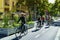 Traffic-calmed street in which one lane is separated by iron flower pots and reserved for cyclists, bicycle tour Berlin