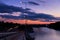 Traffic and city lights by the river Sava at twilight in Belgrade