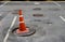 Traffic cone on drain lid