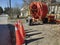 Traffic cone and orange pipes for fibre optics in a city road construction