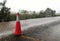 Traffic cone in raining for background