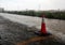 Traffic cone in raining for background