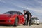 Traffic Cop Stopping Red Sports Car