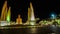 Traffic at democracy monument in bangkok at night