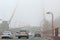 Traffic On The Foggy Golden Gate Bridge