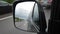 Traffic on German highway - view through rear-view mirror