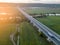 Traffic on highway bridge on sunny summer evening