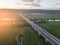 Traffic on highway bridge on sunny summer evening