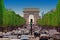 Traffic jam with cars in Paris city, France. view of Arc de Trio