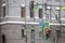 traffic light and burly footpath signs on a brick building background