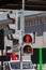 Traffic light with forbidding red signal for pedestrians on the city street closeup