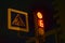 Traffic light at the intersection at night for pedestrians and cars