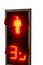 Traffic light with a timer for pedestrians on a white background. The red prohibition signal lights up. Isolated over white