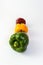 Traffic lights green paprika in front yellow and red bell pepper behinde