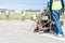 Traffic marking machine and worker mark thermoplastic paint on the floor in Symbols on the cement floor