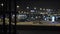 Traffic in night city, cars drive, defocused and blurred video, bokeh urban lights scene