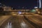 Traffic at night  on the interstate cars police cars signs and light trails