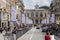 Traffic and people walking on Faidherbe street. Lille, France.