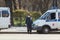 Traffic policeman controls the traffic in the city center