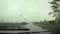 Traffic in Rain, Driving Car, Storm on the Road, Highway, Rainy Drops View on Windscreen