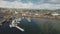 Traffic road at sea bay coast aerial. Pier town with old buildings. Ships and yachts at wharf