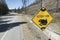 Traffic Road Sign. Frog Animal Crossing Caution in Banff National Park, Canada