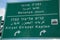 Traffic Road sign to Netanya East. Entrance to Netanya industrial zone in Israel. Trilingual road sign in Israel