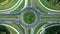 Traffic roundabout with movement transportation circle road crosswalk top aerial shot