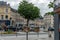 Traffic and rush hour in the square of a small French village