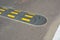 Traffic safety speed bump on an asphalt road. Speed bumps (or speed breakers)