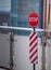 Traffic safety warning signage, A stop restrictive octagon sign with red, white vertical diagonal stripes striped delineators