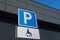 Traffic sign ACCESSIBLE PARKING near building outdoors