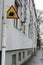 Traffic sign attention hedgehog on a house in Helsinki