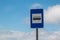 Traffic sign Bus stop and a cloudy sky