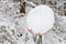 Traffic sign covered with snow