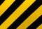 Traffic Sign: A rectangular sign with diagonal yellow and black stripes, wherever there is a median or other obstruction.